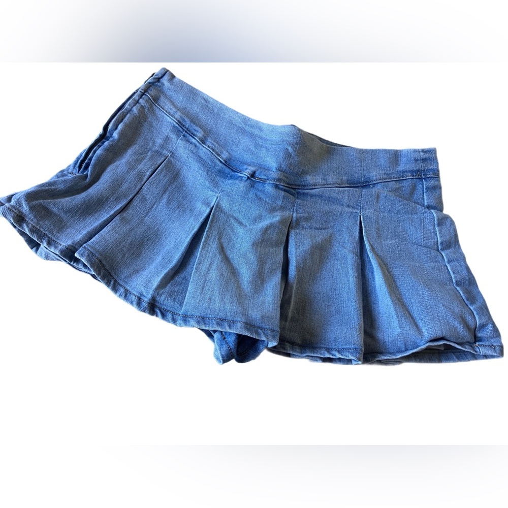 Mini blue denim skort.